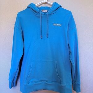 Peloton branded bright blue hoodie
